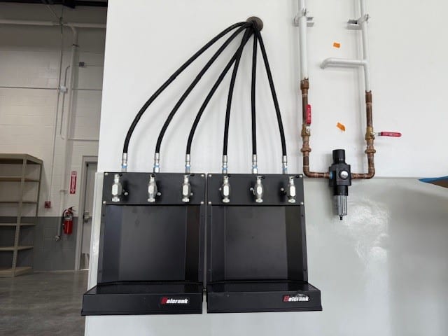 Balcrank dual oil bar system for automotive service.